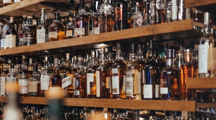 Photo of dozens of bottles of liquor