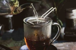 brewing tea with a sieve