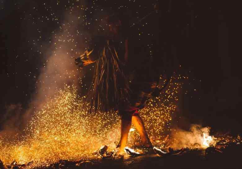 woman dancing near fire