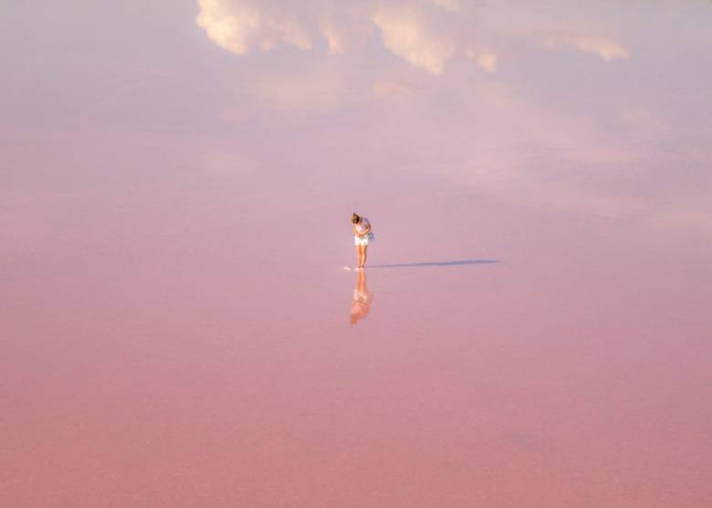 girl with pink sky background