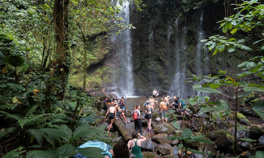 group visiting waterfall