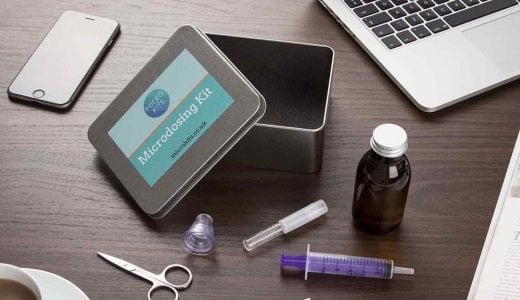 microdosing kit, a laptop and an iphone